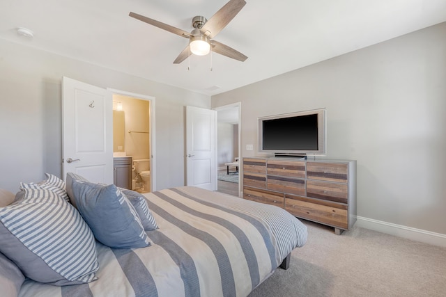 3173 Hugh Bennett Dr, Johns Island, SC 29455 - carpeted bedroom with baseboards, connected bathroom, and ceiling fan