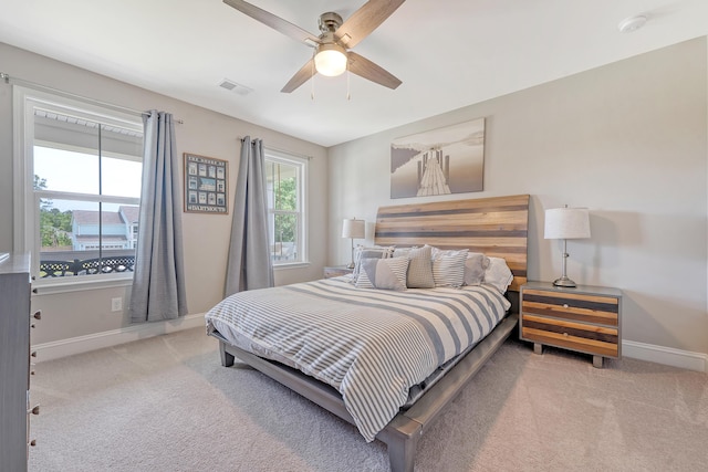 3173 Hugh Bennett Dr, Johns Island, SC 29455 - carpeted bedroom with baseboards and a ceiling fan