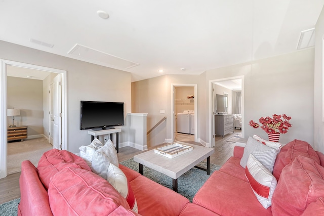 3173 Hugh Bennett Dr, Johns Island, SC 29455 - living area with attic access, independent washer and dryer, light wood-type flooring, and baseboards