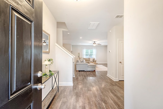 foyer entrance featuring ceiling fan, recessed lighting, baseboards, wood finished floors, and visible vents