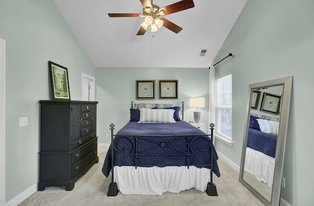 carpeted bedroom featuring ceiling fan and lofted ceiling