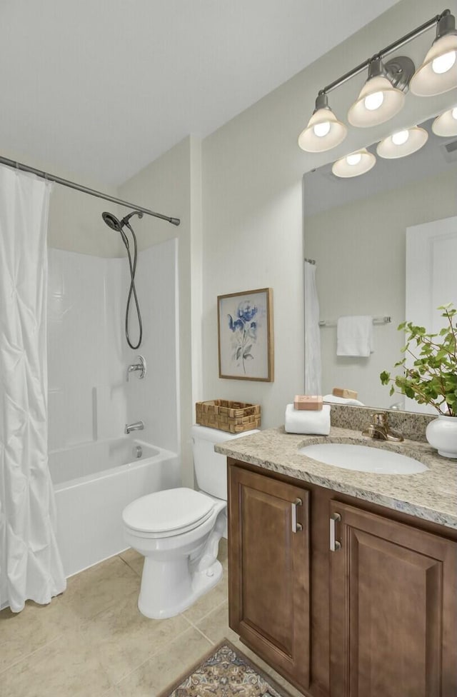 full bathroom with toilet, tile patterned floors, vanity, and shower / bath combo