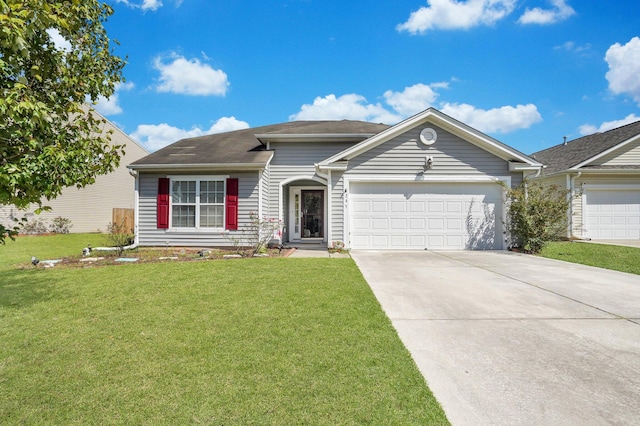 ranch-style home featuring a front lawn and a garage