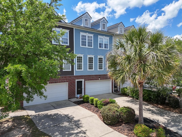 9206 Southern Oak Ln, Ladson, SC 29456 - view of property with an attached garage, concrete driveway, and brick siding