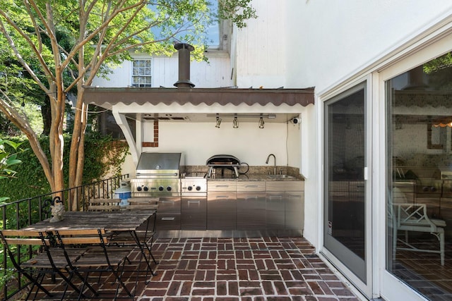 1661/2 Queen St, Charleston, SC 29401 - view of patio / terrace with exterior kitchen, area for grilling, and a sink