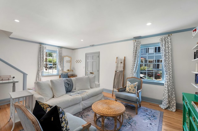 1661/2 Queen St, Charleston, SC 29401 - living room with light wood finished floors, recessed lighting, ornamental molding, and baseboards