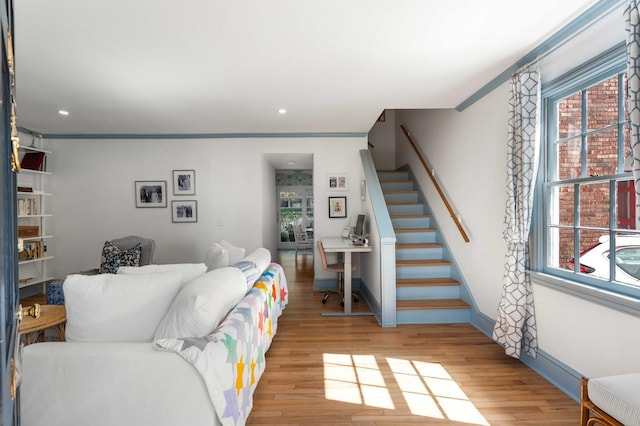 1661/2 Queen St, Charleston, SC 29401 - living room featuring light wood-style flooring, stairs, an office area, recessed lighting, and baseboards