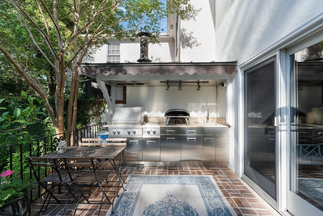 1661/2 Queen St, Charleston, SC 29401 - view of patio featuring grilling area, area for grilling, and a sink