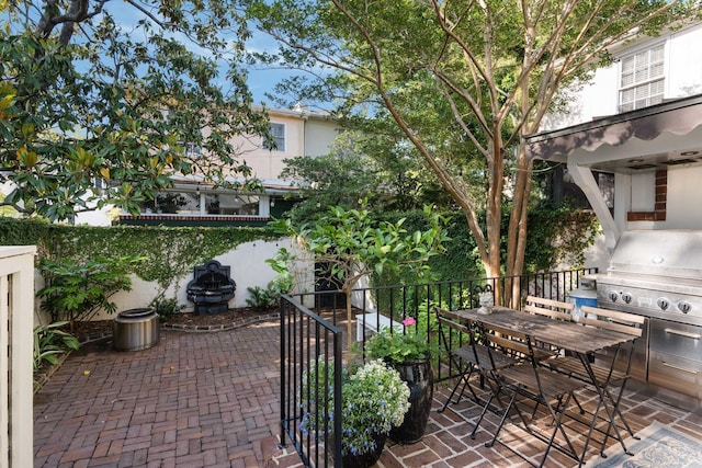 1661/2 Queen St, Charleston, SC 29401 - view of patio / terrace with area for grilling and outdoor dining area