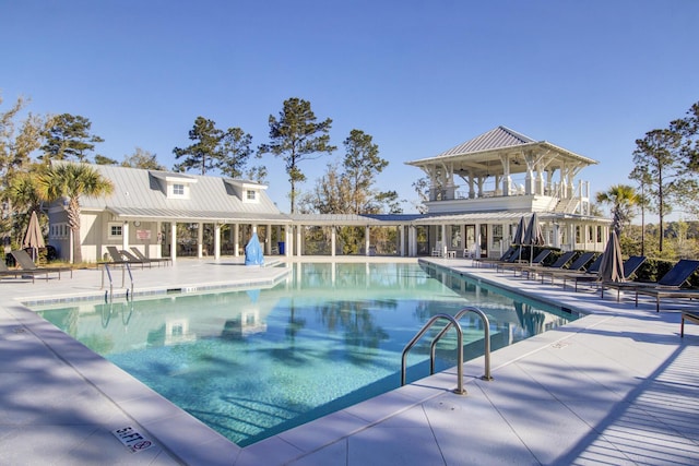 community pool with a patio