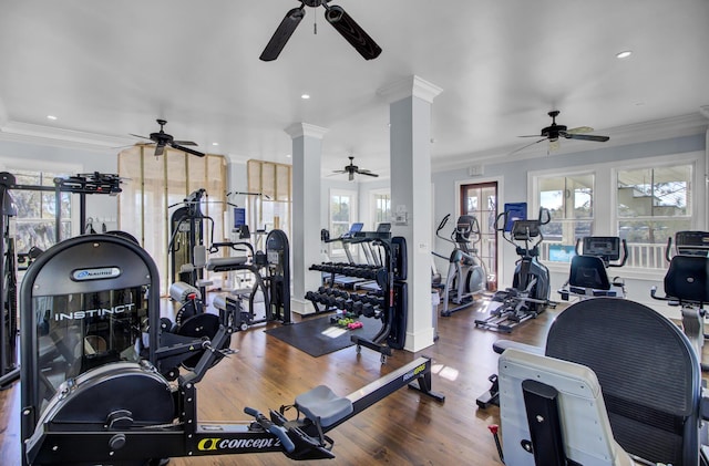 workout area with ceiling fan, crown molding, wood finished floors, recessed lighting, and decorative columns