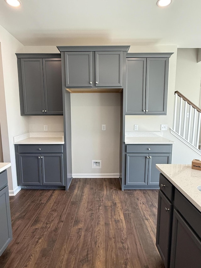 kitchen with dark wood-type flooring, recessed lighting, and gray cabinetry