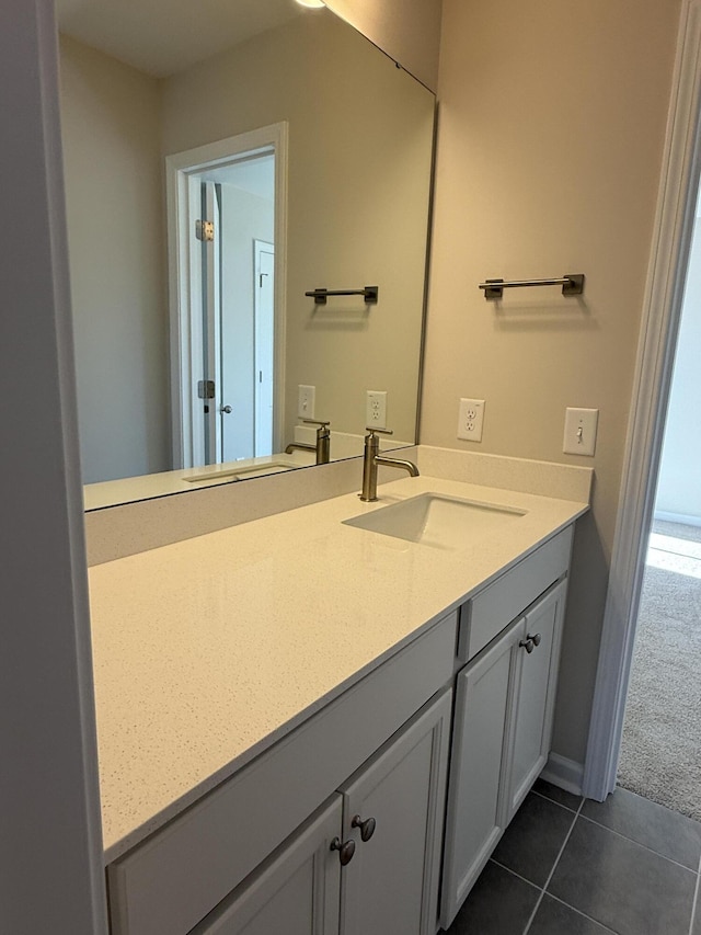 bathroom featuring vanity and tile patterned flooring