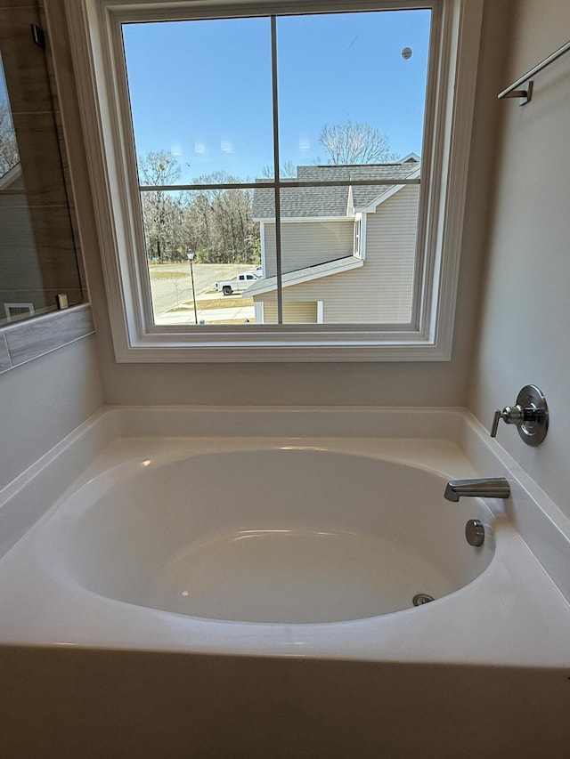 full bathroom featuring a garden tub