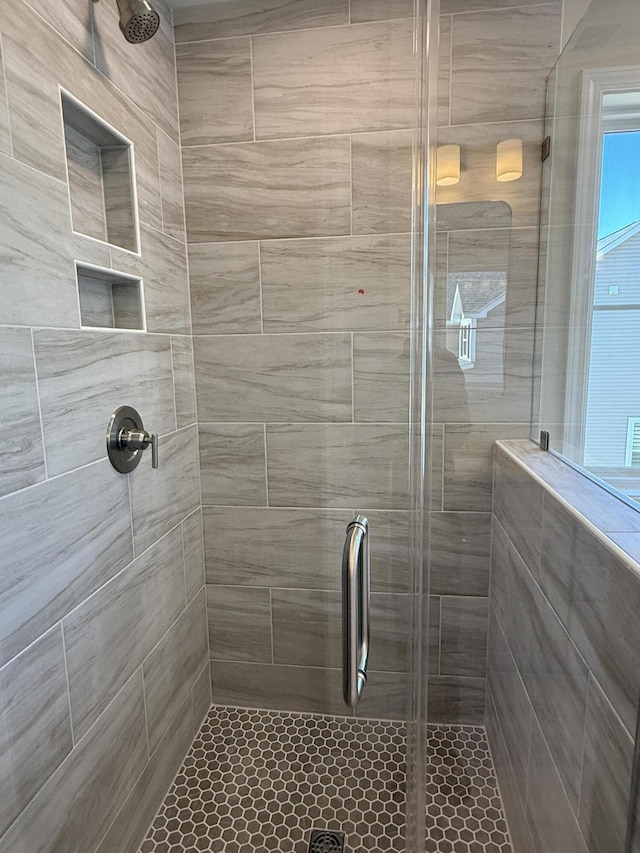 full bathroom with a stall shower