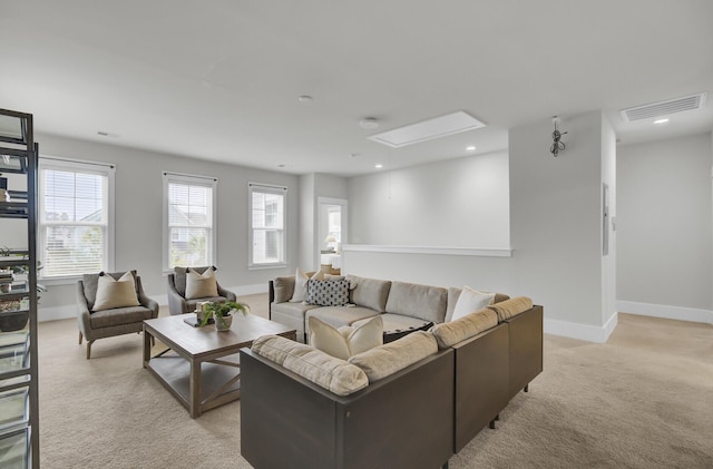 living room featuring light colored carpet