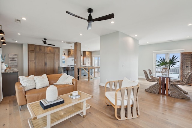1568 E Ashley Ave, Folly Beach, SC 29439 - living area featuring a ceiling fan, healthy amount of natural light, light wood-style flooring, and recessed lighting