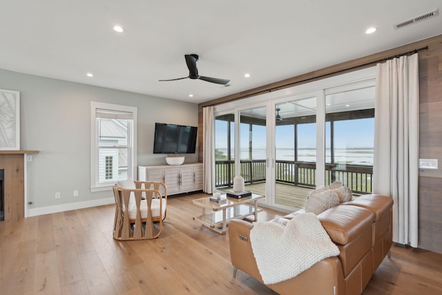 1568 E Ashley Ave, Folly Beach, SC 29439 - living room with plenty of natural light, a ceiling fan, light wood-style flooring, and recessed lighting