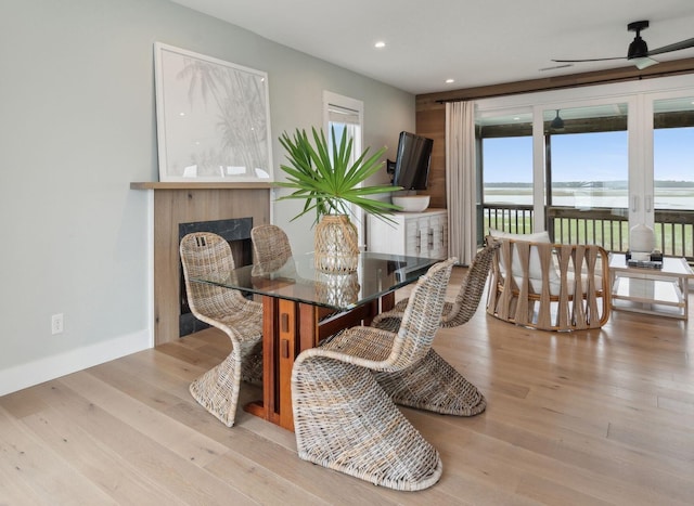 1568 E Ashley Ave, Folly Beach, SC 29439 - dining room featuring ceiling fan, recessed lighting, wood finished floors, and a high end fireplace