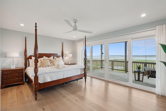 1568 E Ashley Ave, Folly Beach, SC 29439 - bedroom with access to outside, a water view, light wood-type flooring, recessed lighting, and a ceiling fan