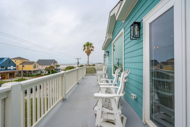 1568 E Ashley Ave, Folly Beach, SC 29439 - balcony featuring a residential view