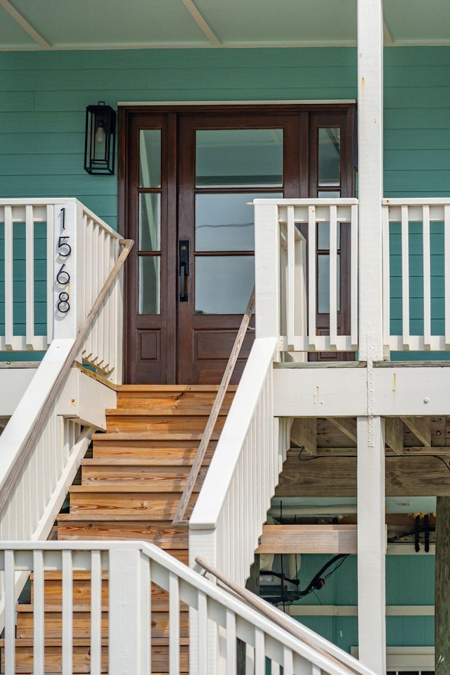1568 E Ashley Ave, Folly Beach, SC 29439 - view of exterior entry featuring french doors