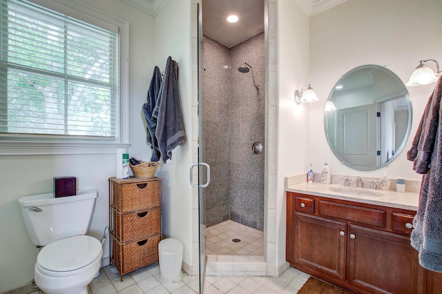 bathroom featuring ornamental molding, tile floors, a shower with door, and toilet