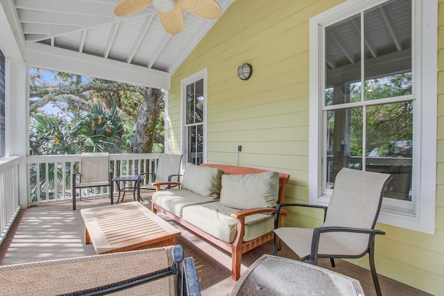 exterior space featuring an outdoor living space and ceiling fan