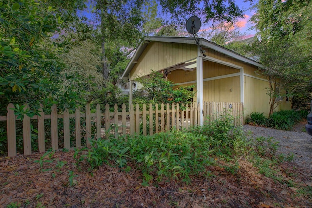 view of property exterior at dusk