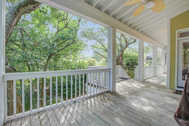 wooden deck with ceiling fan