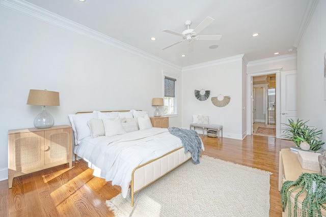 bedroom featuring recessed lighting, light wood-type flooring, baseboards, and ornamental molding