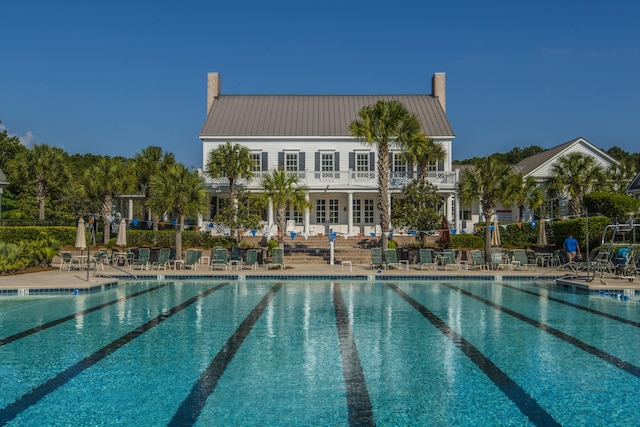 community pool with a patio