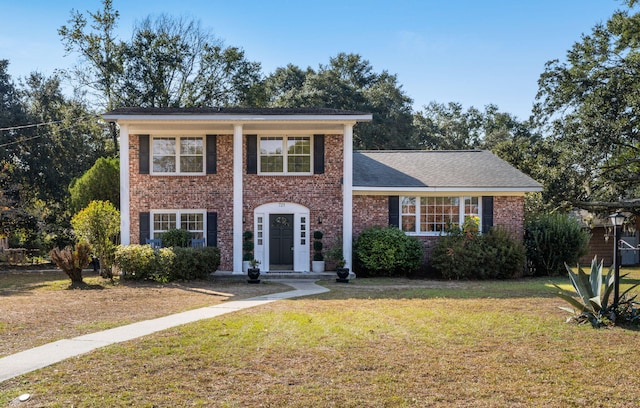 view of front of property with a front lawn