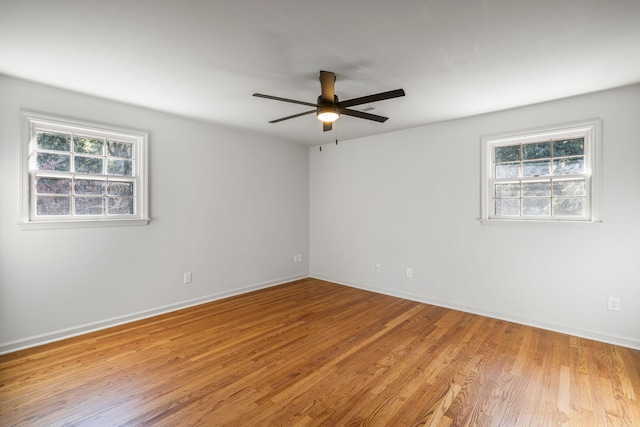 empty room featuring light hardwood / wood-style floors and ceiling fan