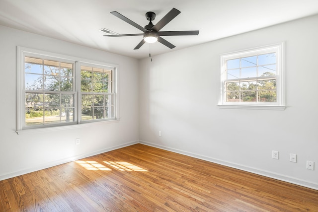 unfurnished room with light hardwood / wood-style flooring and ceiling fan