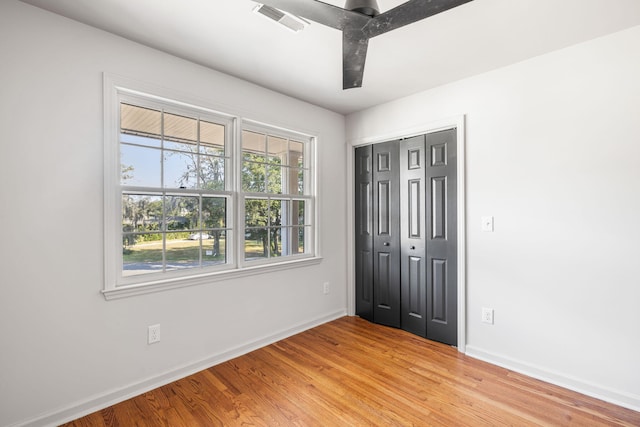 spare room with light hardwood / wood-style floors