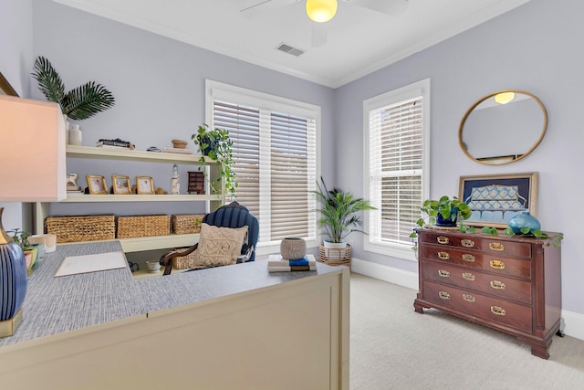 home office featuring ornamental molding, light colored carpet, and ceiling fan