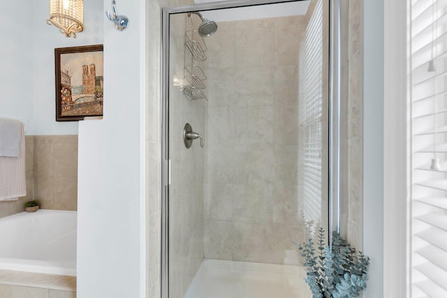 bathroom with independent shower and bath