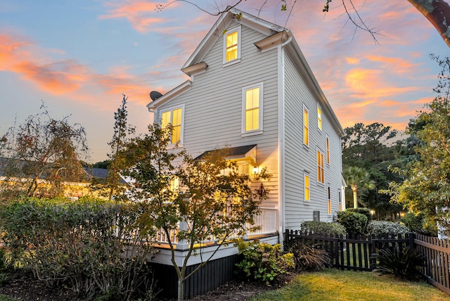 view of property exterior at dusk