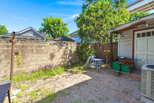 12 Grove St, Charleston, SC 29403 - view of yard featuring central AC