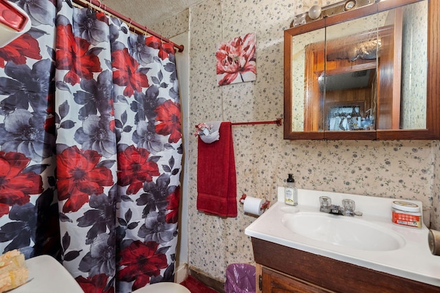 12 Grove St, Charleston, SC 29403 - bathroom featuring toilet, wallpapered walls, vanity, and curtained shower