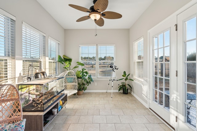 sunroom / solarium with ceiling fan