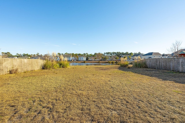 view of yard featuring a water view