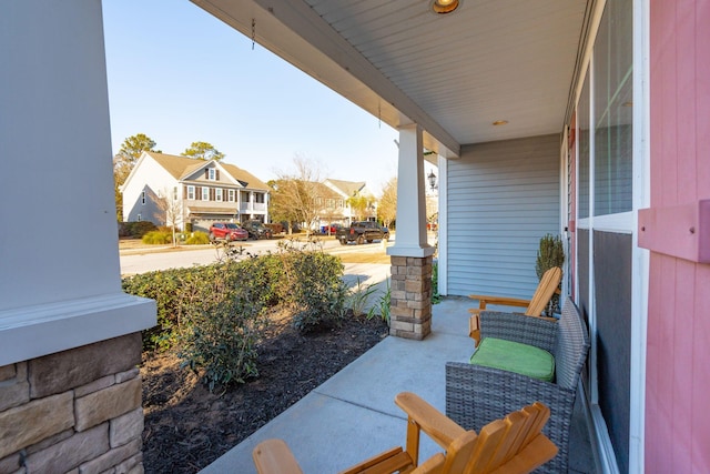 view of patio featuring a porch