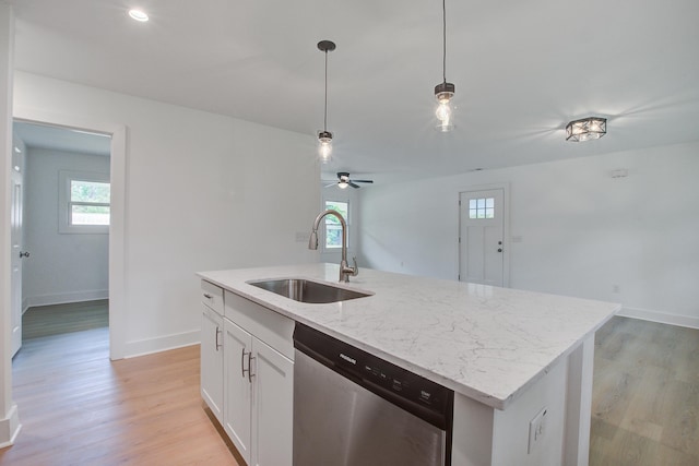 2135 Clayton St, Charleston, SC 29414 - kitchen with a sink, stainless steel dishwasher, light wood-type flooring, and decorative light fixtures