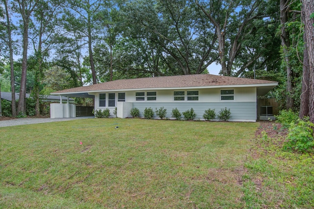 2135 Clayton St, Charleston, SC 29414 - single story home featuring gravel driveway, a carport, and a front yard
