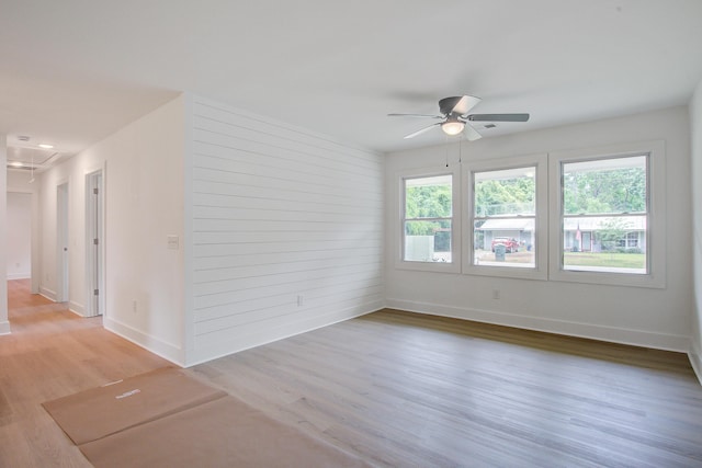 2135 Clayton St, Charleston, SC 29414 - empty room featuring ceiling fan, attic access, light wood-type flooring, and baseboards