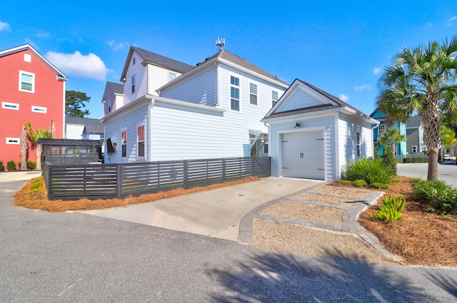 view of front of property with a garage