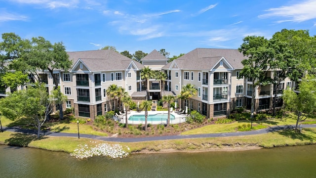 drone / aerial view with a water view