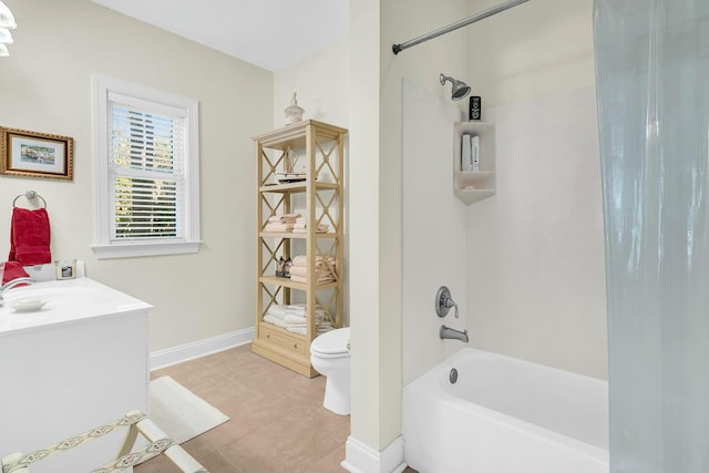 full bathroom with vanity, bathtub / shower combination, tile patterned floors, and toilet